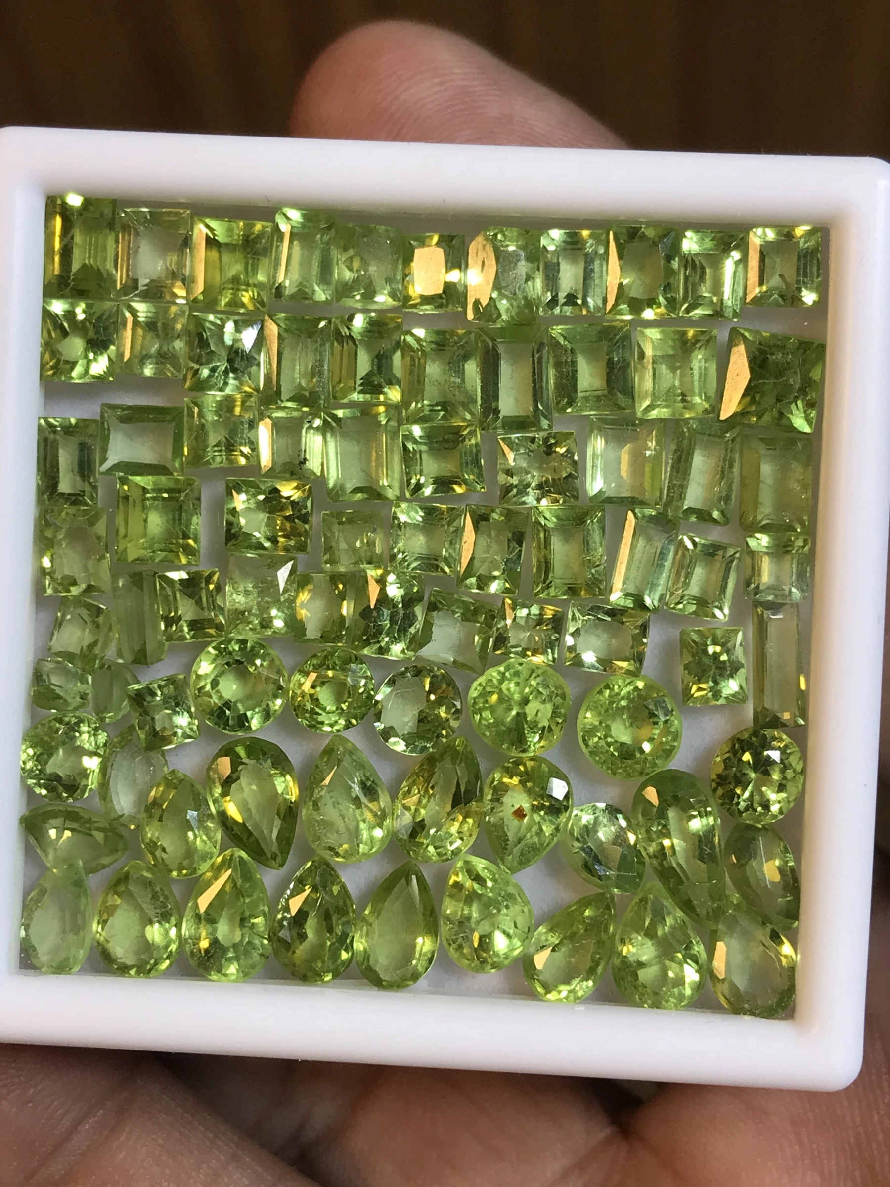 Faceted peridot selection — client photograph